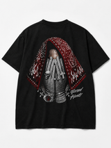 The VAKO. Sacred Hands Tee explores the balance between faith, struggle, and inner strength. The centerpiece features folded hands draped beneath a paisley veil, layered with premium jewelry and symbolic details that represent resilience, devotion, and identity. Designed with a vintage-inspired aesthetic, every texture and distressed element adds depth while maintaining a clean luxury streetwear feel.
